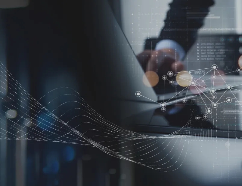 A person on a tablet visualizing data graphics symbolizing success through data management as a service.