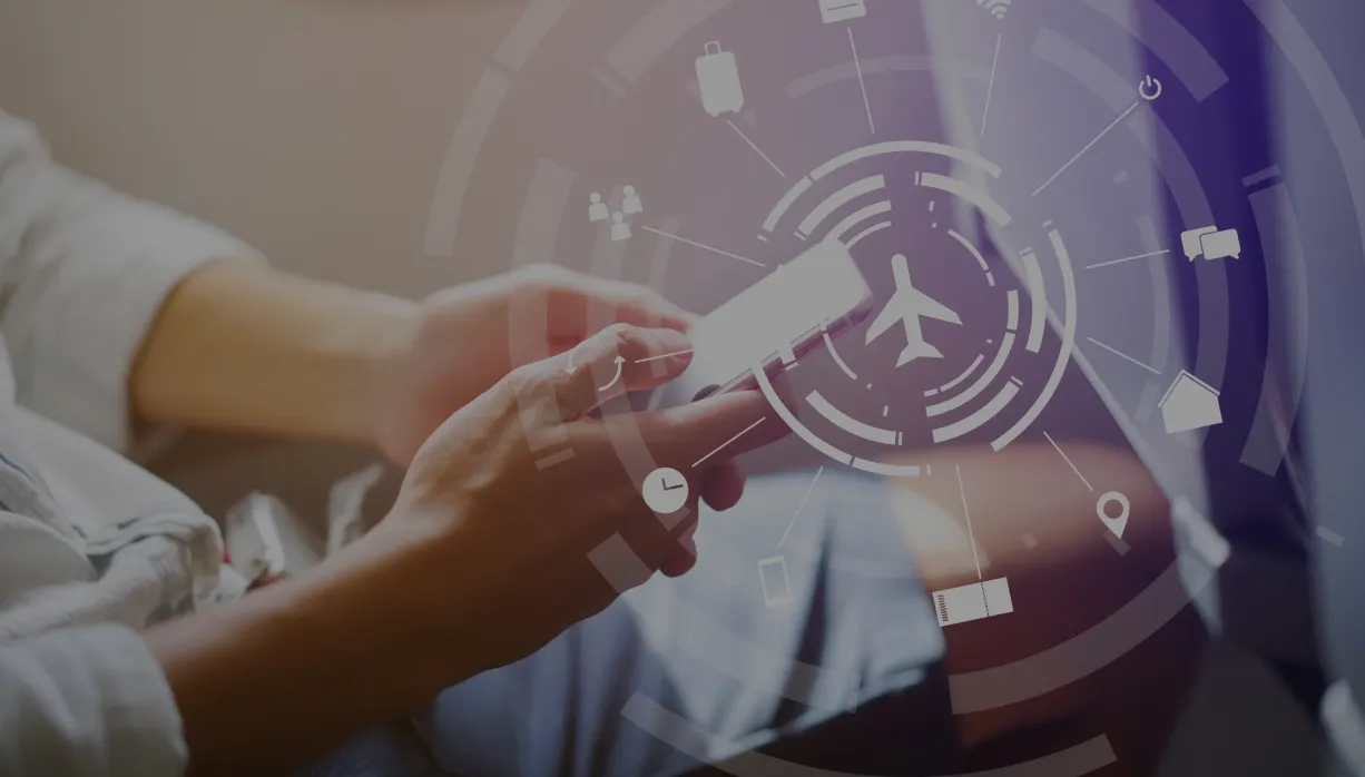 Image showing a person using a laptop to manage travel data.